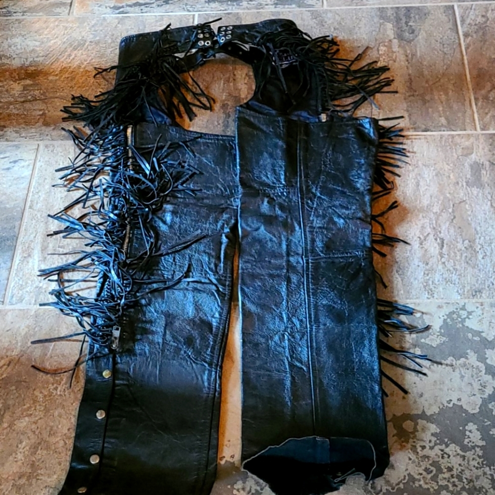 Size L leather chaps with purple floral cutouts.